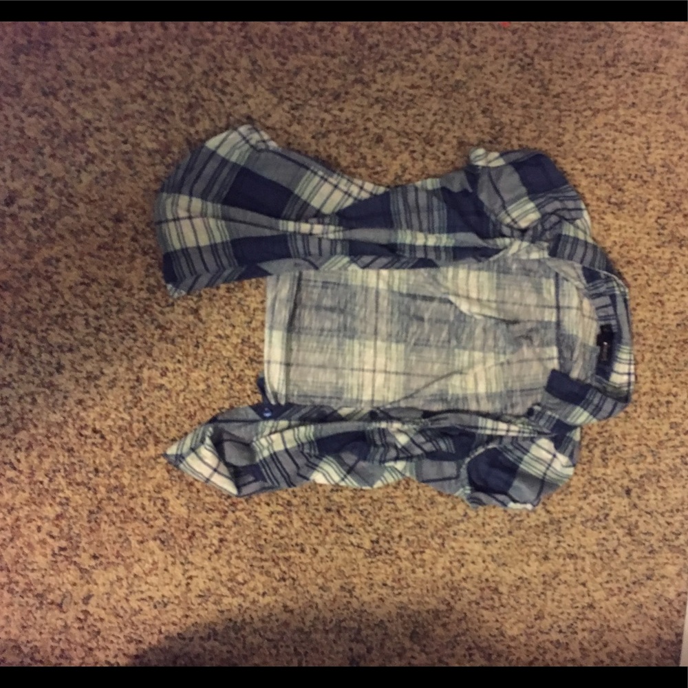 Blue plaid button up shirt.